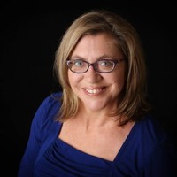 Suzanne E.