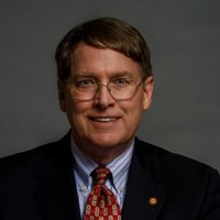 Rick Bragga, CFRE, JD, FAHP, FAFP