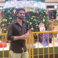 Surya T
