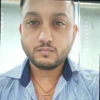 Dinesh T.