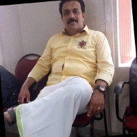 P K Denesh