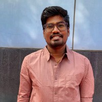 Vignesh E