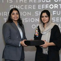 Uzma M.