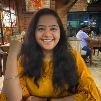 Nidhi K