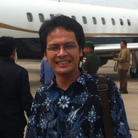 E. Fernando M. Manullang