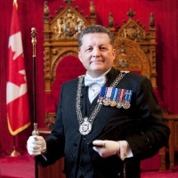 J. Greg Peters, M.V.O.