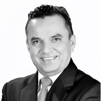 Dr. Carlos Coca Singh