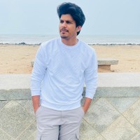 Manohar B
