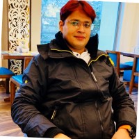 Dr Arun Jha