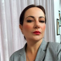 Simoni C.