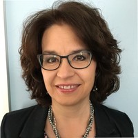 Laura E Marti