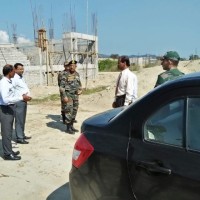 M H Khan
