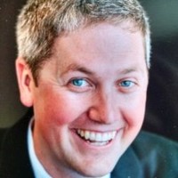 John M. Aura