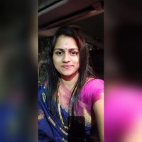 Nisha B