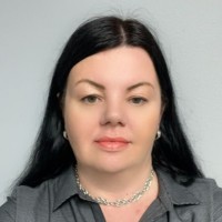 Elena Houk, Mba