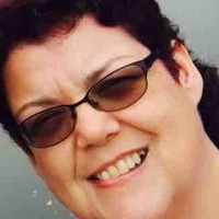 Kathi J Grant