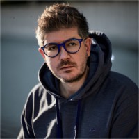 Dr. Christian Happ