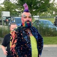 Mark W. Beacock   He/Him