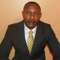 E. RAYMOND AKOKO, Esq. LL.M