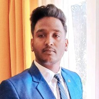 Suman B