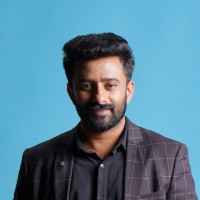 Binu John P