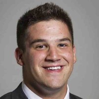 Bradley Thomas, M.F.