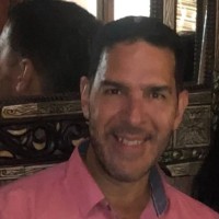 Julian T. Ortiz— MBA, PCC