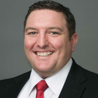 Travis May