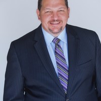 Travis M.
