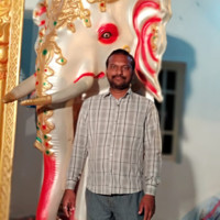 Dinesh M