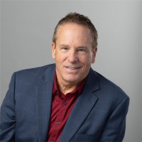 Joel E.