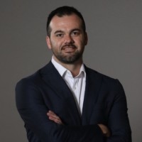 Chris Spinos, Cfa
