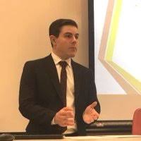 André W. Thom, J.D.