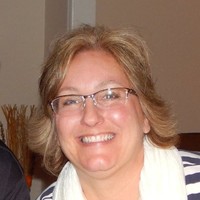 Caron B.