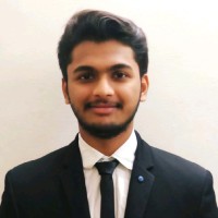 Karthik B.