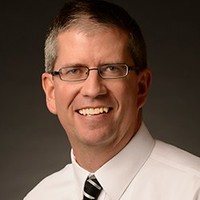 Bruce Gillett, Cpg