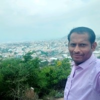 Murugesan J