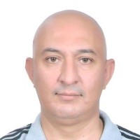 Refik E.