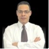 Kal Hassan, Cism
