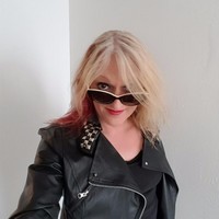 Andi West
