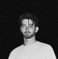 Travis E.