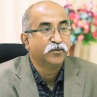 Dr. R Ravindra