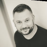 Adam B.