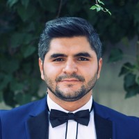 Turgay A.