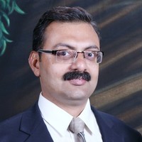 Ashok Tikalkar, BE, MBA (IIM-B), CISA, CSM