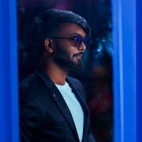 Naveen M