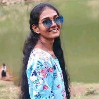 Aruna T