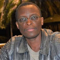 Benson Okita-Ouma, PhD.