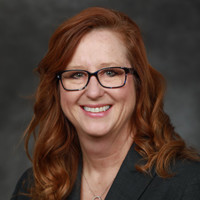 Kim Kenville, Ph.D., C.M.