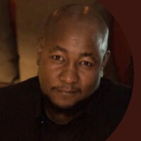 Aron E.Furahini